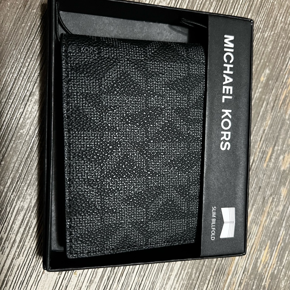 Michael Kors Textured Black slim bifold wallet